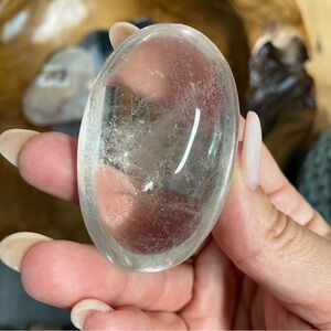 Clear Polished Crystal Palm Stone. High grade clear quartz Palm stone.